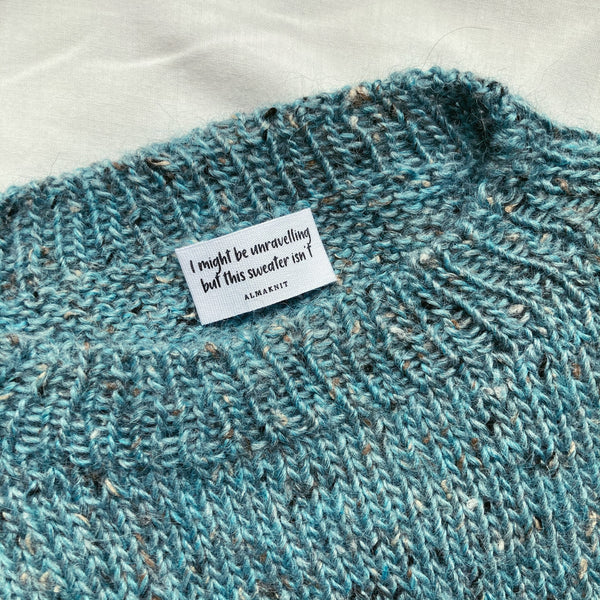 Tweed strikvest med bomuldslabel fra AlmaKnit