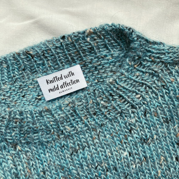 Tweed strikvest med label i bomuld fra AlmaKnit